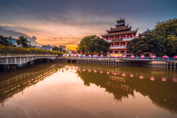 Twilight view of Phap Hoa Pagoda, Ho Chi Minh city, Vietnam. The ancient temple in Southeast Asia. on the vesak festival 2021.