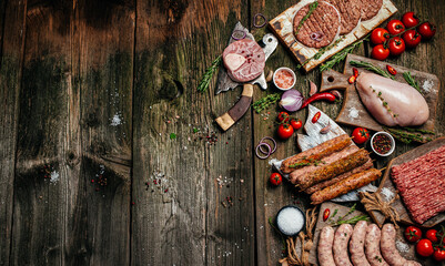 Raw meat, cutlet and sausages. Shooting for the catalog. banner, menu, recipe place for text, top...