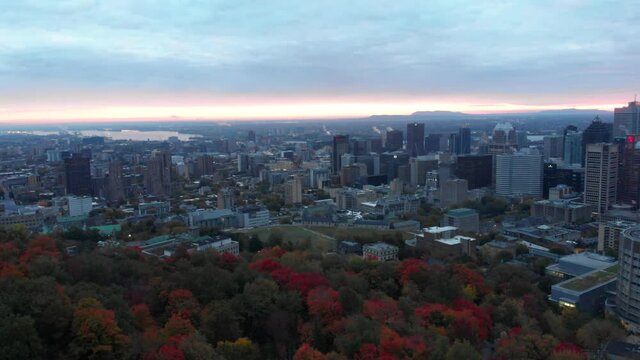 Aerial shot over a Montreal sunset, from the belvedere Kondiaronk, Mont-Royal Park.