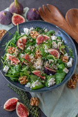 healthy barley salad with fresh figs, feta cheese and walnuts