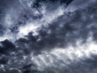 Naklejka na ściany i meble Dramatic storm clouds sky background.