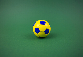 Soccer ball on the green lawn of the field. Football field. Football tournament. Soccer ball. Sports team game. Sport equipment. Healthy lifestyle. Background image.