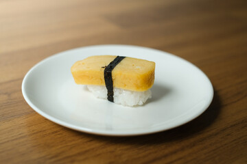 Sweet egg sushi menu set in plate, Japanese food