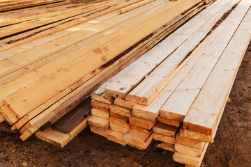 Stack of edged board on the construction site