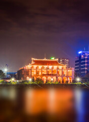 Fototapeta na wymiar Nha Rong habor at night, located at the foot of Khanh Hoi bridge, Ho Chi Minh city, Vietnam.