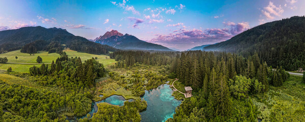 Zelenci Springs Sunset Sunrise in Slovenia NAture Reserve Aerial Panoramic View - obrazy, fototapety, plakaty