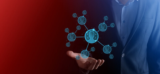 Businessman holding on hand icon of user man,woman low poly polygon style. Internet icons interface...