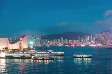 Obraz premium Vessel of Star Ferry sailing across the VIctoria Harbour at night
