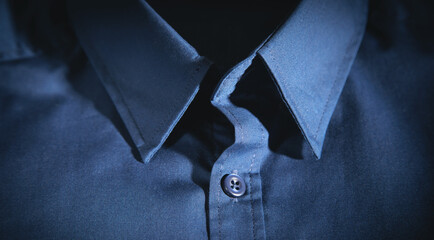 Closeup view of stylish dark blue shirt.