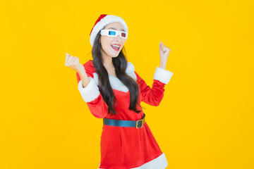 Portrait young asian woman wear christmas costume with action on yellow background