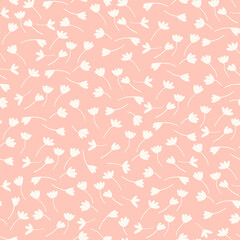 Seamless pattern with hand drawn meadow flowers in Boho style. Wildflowers illustrations on pink background for surface design and other design projects