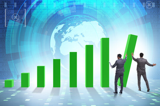 Businessman supporting economic growth on chart