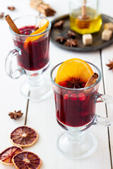 Mulled wine with cinnamon, cranberry and orange. Hot drink. Winter.