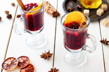 Mulled wine with cinnamon, cranberry and orange. Hot drink. Winter.