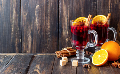 Mulled wine with cinnamon, cranberry and orange. Hot drink. Winter.