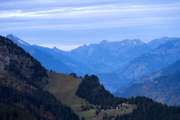 Fototapeta premium Mountain panorama seen from Axalp at Bernese Highlands on a grey cloudy autumn day. Photo taken October 19th, 2021, Brienz, Switzerland.
