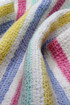 close-up of a knitted fabric background. Colorful kitchen cloth