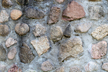 Texture of a stone wall. Old castle stone wall texture background