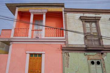 Beautiful historic urban decay graffiti building facades in Arica, Chile Old Town Downtown area with churches, cathedrals and ancient houses in romantic side streets backstreet alleys