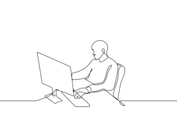 man typing on keyboard in front of computer - one line drawing vector. concept of working at stationary computer; worker at work; freelancer working from home (copywriter, writer, journalist)