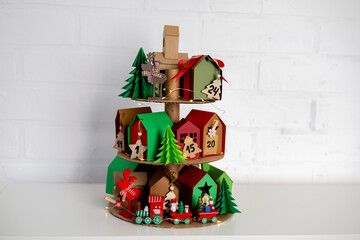 Advent calendar diy. Waiting for Christmas. House shaped boxes.