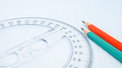 High angle close up view of ruler and pencil on paper