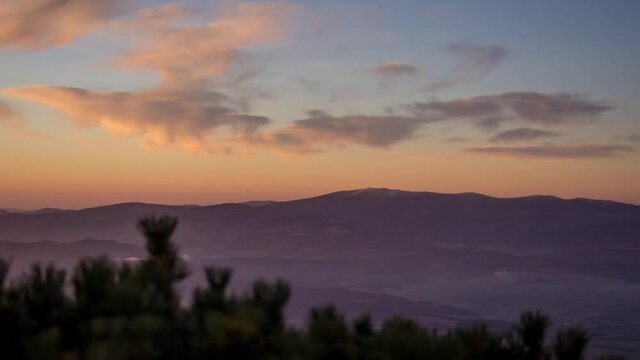 Timelapse of sunrise over Low Tatras mountains national park from High Tatras mountains national park in Slovakia