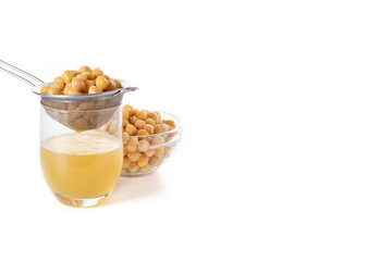 Chickpea water aquafaba isolated on white background. Copy space. Chickpea water is a substitute for eggs in pastries	
