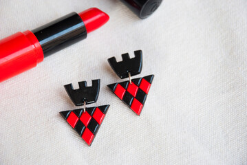 Fashion jewelry in red and black of polymer clay.