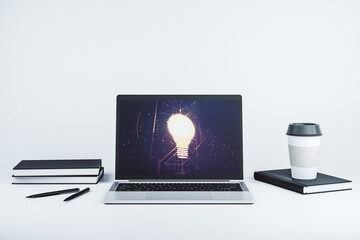 Creative light bulb hologram on modern laptop monitor, idea concept. 3D Rendering