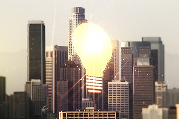Virtual Idea concept with light bulb illustration on Los Angeles skyline background. Multiexposure