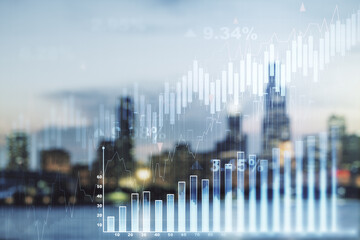 Abstract virtual financial graph hologram on blurry skyscrapers background, financial and trading concept. Multiexposure