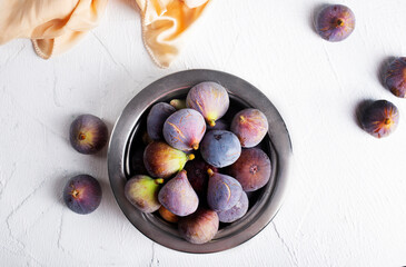 Portion of fresh Figs on light background