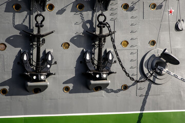 Iron anchor at a steel ship.