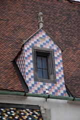 Unusual window with nice blue, white and red colour in the city centre.