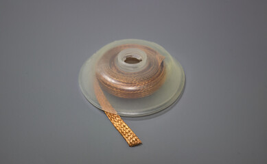 Desoldering braid or desoldering wick. Pre-fluxed copper braid that is used to remove solder, which...