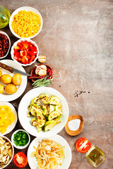 Vegetables in plates. baked and fried vegetables. Selective focus.