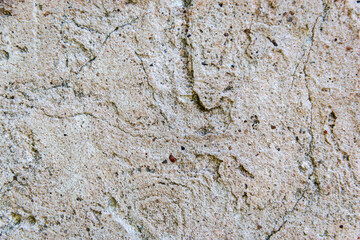 Texture of rough gray-pink cement plaster with holes and cracks. Texture. Background.