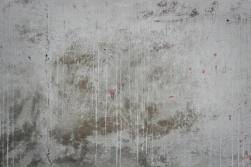 Old white wall with gray streaks covered with cement. Ugly wall but beautiful texture.