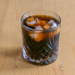 glass of cola with ice