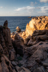 Fototapeta na wymiar Amazing and spectacular rock formations at the coast of Sardinia, Italy in a hot summer day