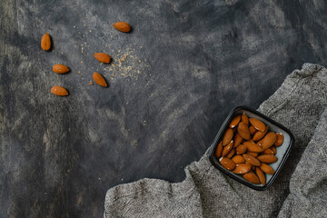 Almond on a wooden background