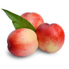 three ripe juicy nectarines with a green leaf on a white isolated background