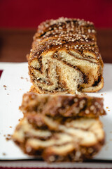 chocolate cake babka on a plate rose color