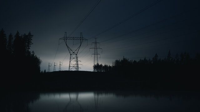 High voltage power line at night