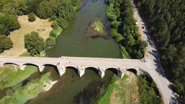 Aerial view of Nineteenth-century bridge over the Yantra River, known as the Kolyu Ficheto Bridge in Byala, Ruse region, Bulgaria