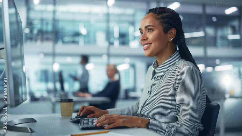 Poster corporate office: black female it technician using desktop computer, uses big data statistics, graph