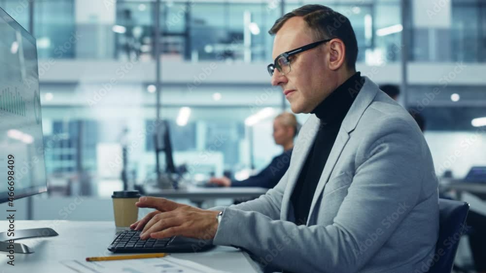 Poster diverse corporate office: stylish handsome big data engineer using desktop computer, screen showing 