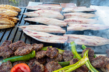 Grilled mackerel in a street market in Istanbul. Grilled mackerel also known as Balik Ekmek...