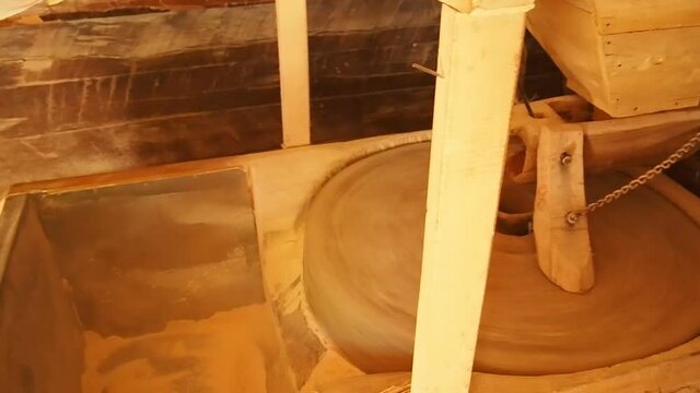 A water mill stone grinding